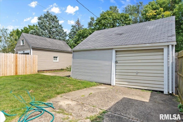 garage with a lawn