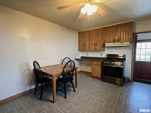 kitchen with ceiling fan and stainless steel range oven