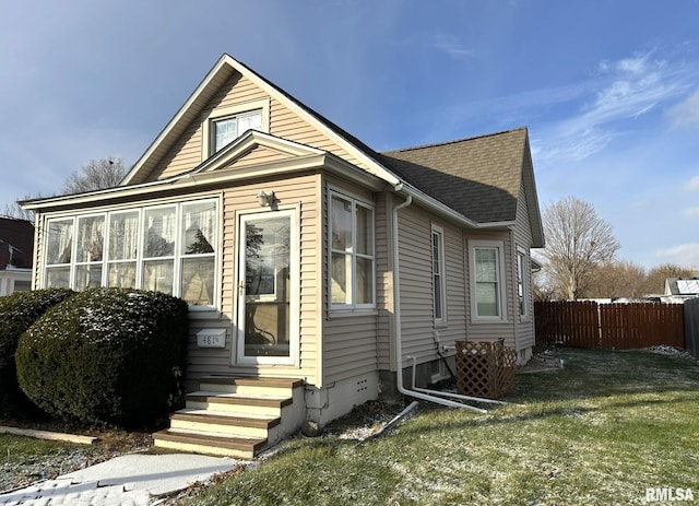 exterior space with a front yard