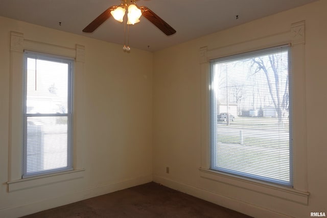 empty room featuring ceiling fan