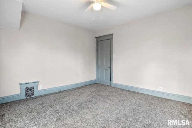 carpeted empty room with ceiling fan