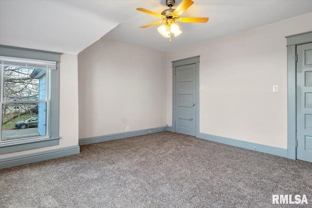 additional living space featuring carpet flooring and ceiling fan