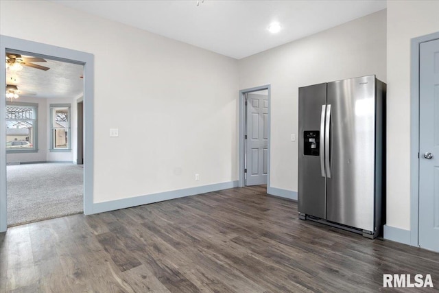 kitchen with ceiling fan, dark wood-type flooring, and stainless steel refrigerator with ice dispenser