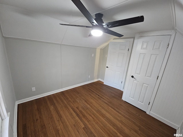 bonus room with dark hardwood / wood-style floors, ceiling fan, and vaulted ceiling