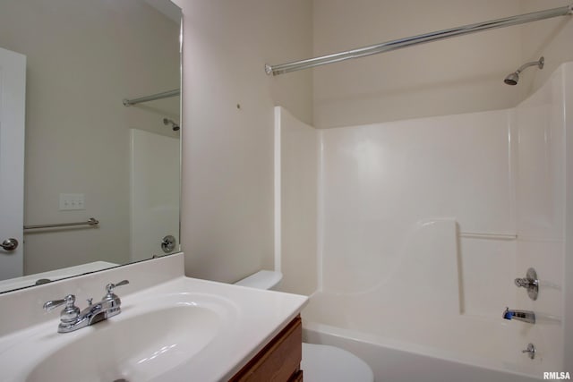 full bathroom with vanity, toilet, and shower / tub combination