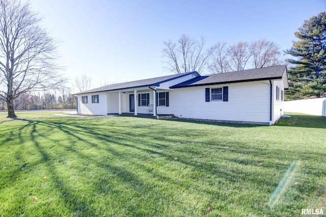 ranch-style house with a front lawn