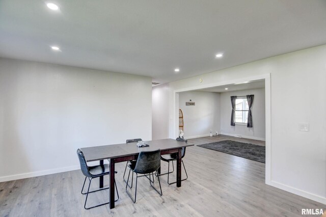 dining room featuring light hardwood / wood-style flooring