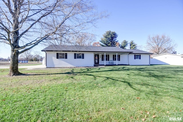 ranch-style home with a front lawn and a porch