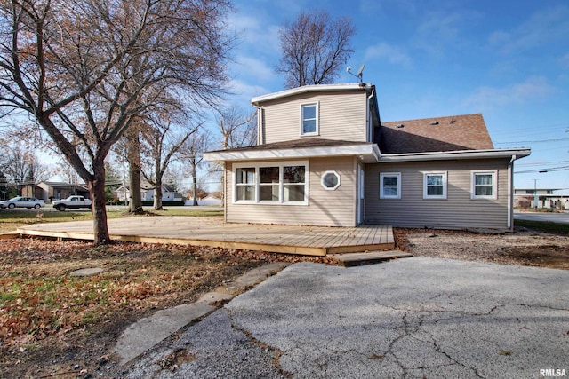 view of front of home with a wooden deck