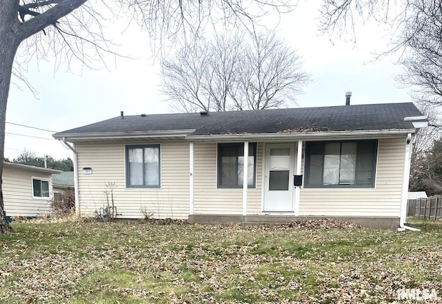 view of front of home with a front lawn