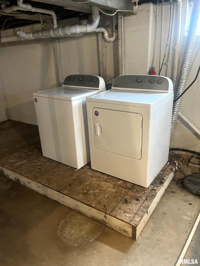 clothes washing area with independent washer and dryer