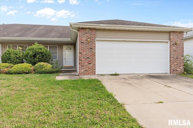 ranch-style home featuring a front lawn and a garage