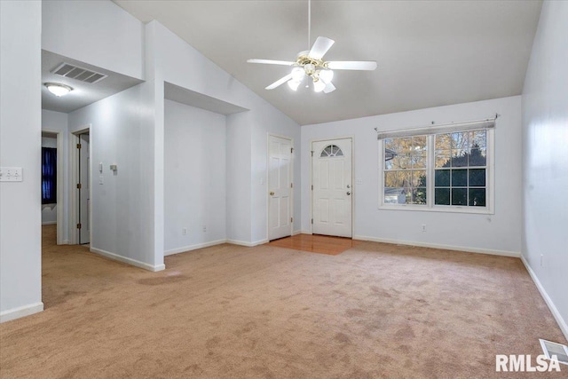 unfurnished room featuring light colored carpet, ceiling fan, and lofted ceiling