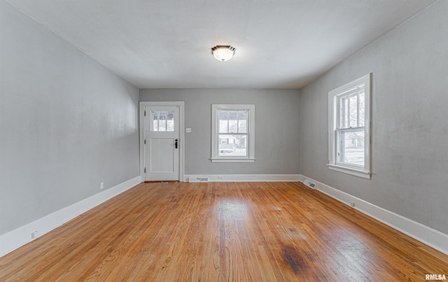 entrance foyer with light hardwood / wood-style floors