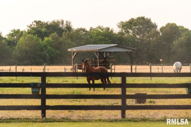 view of gate featuring a rural view