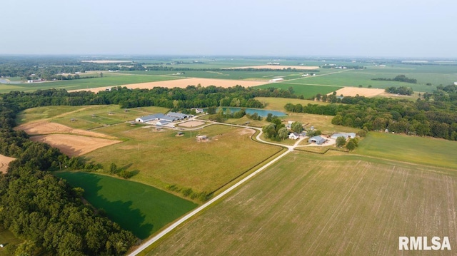 drone / aerial view with a rural view and a water view