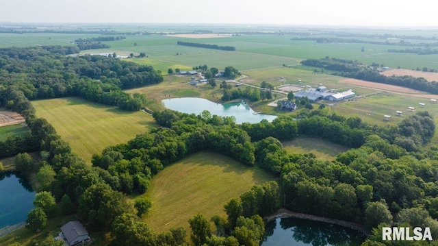 birds eye view of property with a rural view and a water view