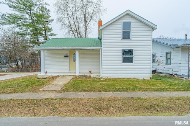 view of front of home with a front yard