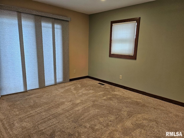 view of carpeted spare room