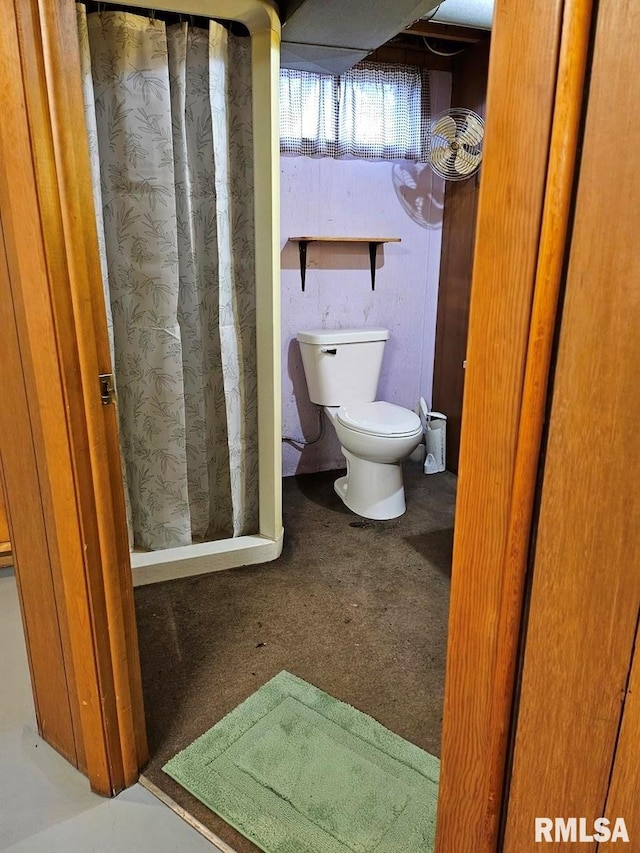 bathroom featuring toilet