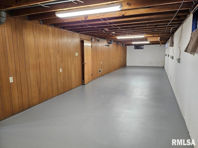 basement with wood walls