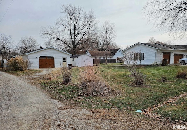 view of property exterior with a garage