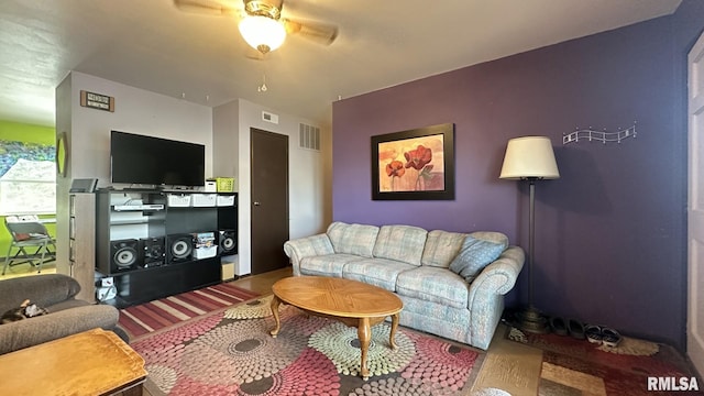 living room featuring ceiling fan