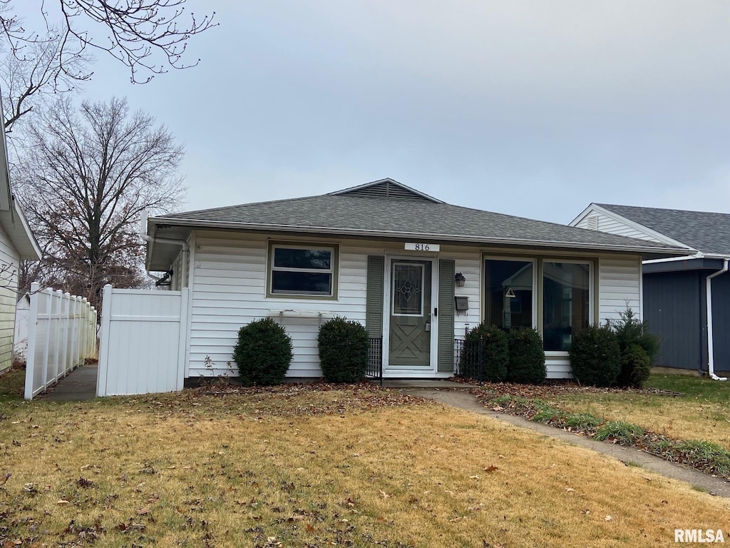 view of front of home with a front yard