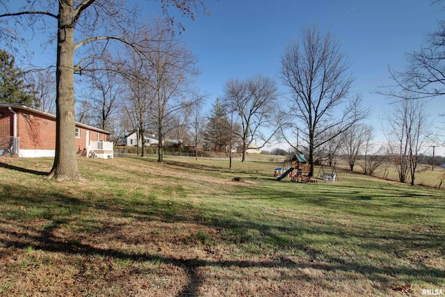 view of yard featuring a playground