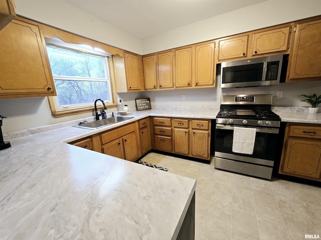 kitchen featuring appliances with stainless steel finishes and sink