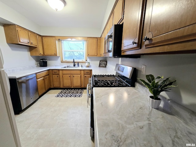 kitchen featuring appliances with stainless steel finishes and sink