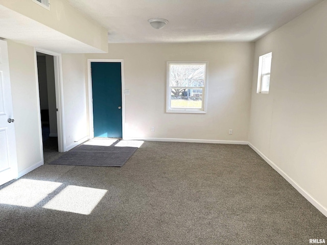 spare room featuring carpet flooring