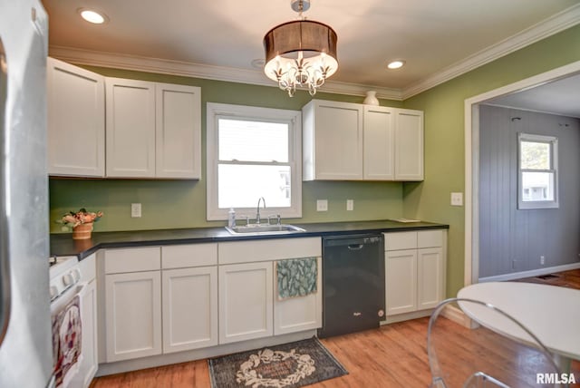 kitchen with white cabinetry, dishwasher, sink, pendant lighting, and light hardwood / wood-style floors