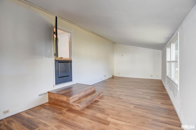 unfurnished living room featuring light hardwood / wood-style flooring