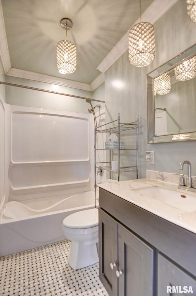 full bathroom with vanity, tile patterned floors, crown molding, toilet, and tub / shower combination