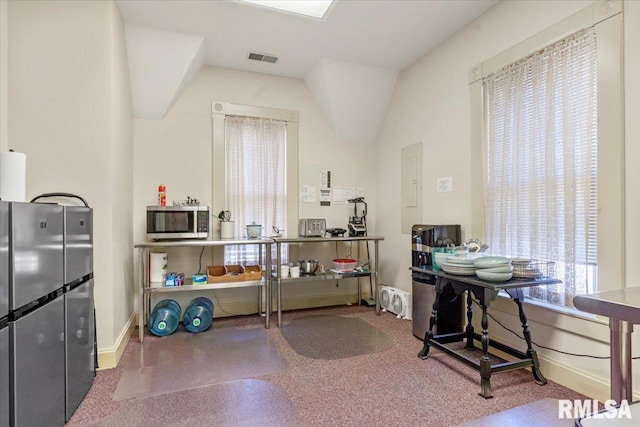 office featuring vaulted ceiling