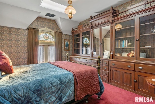 bedroom featuring carpet flooring and vaulted ceiling