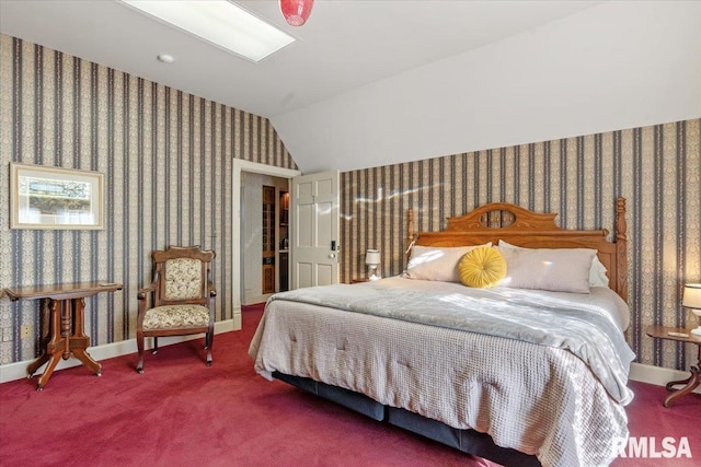 carpeted bedroom featuring vaulted ceiling