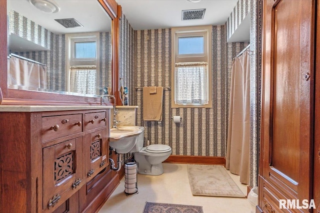 bathroom featuring toilet