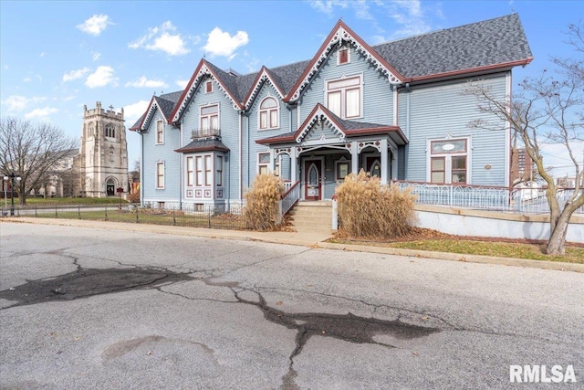 victorian-style house with covered porch