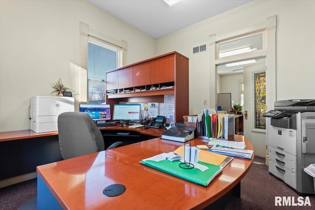 office area featuring dark carpet