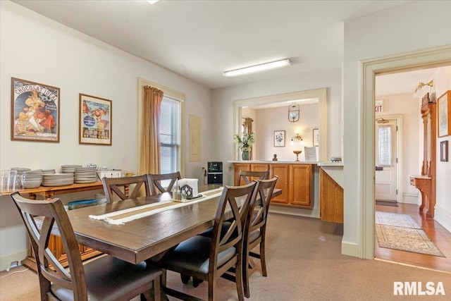 view of carpeted dining room