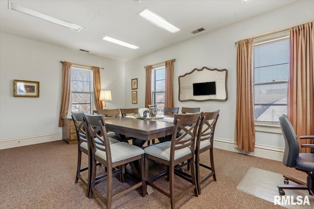 view of carpeted dining room