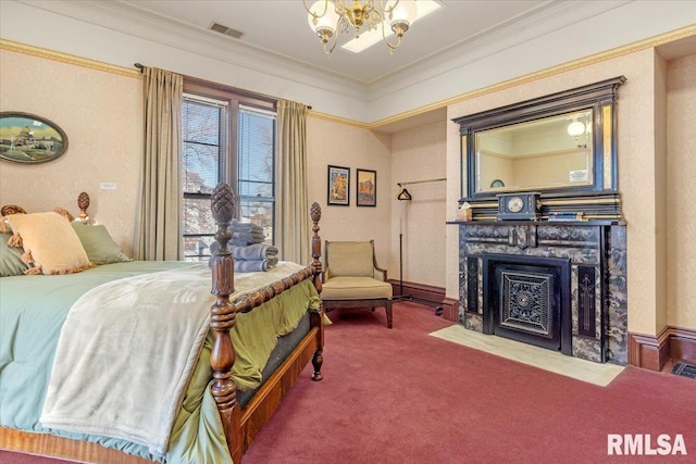 bedroom with a chandelier, carpet floors, a stone fireplace, and ornamental molding