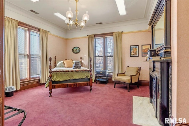 bedroom featuring carpet, a notable chandelier, and ornamental molding