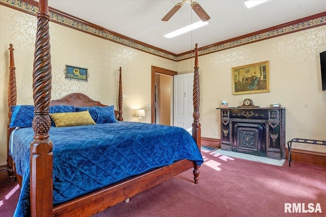 bedroom featuring carpet, ceiling fan, and ornamental molding