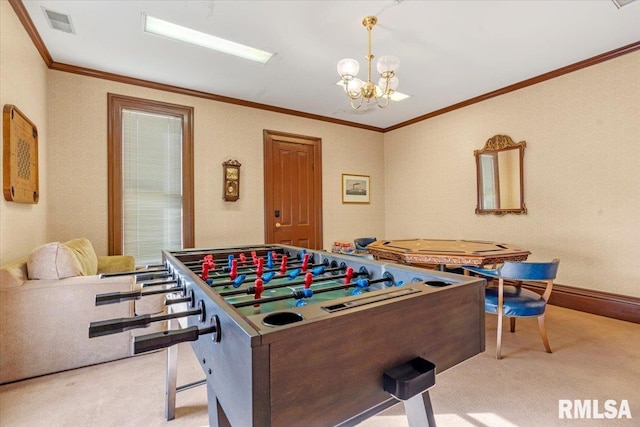 recreation room featuring ornamental molding, light carpet, and an inviting chandelier