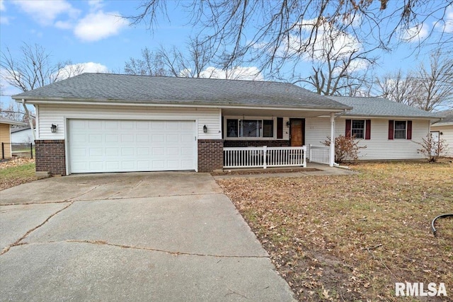 single story home featuring covered porch and a garage