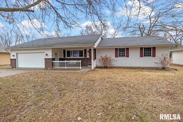 single story home with a front lawn, a porch, and a garage