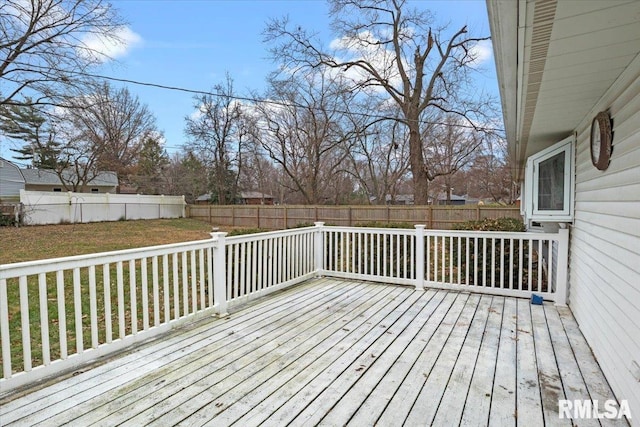 deck featuring a lawn